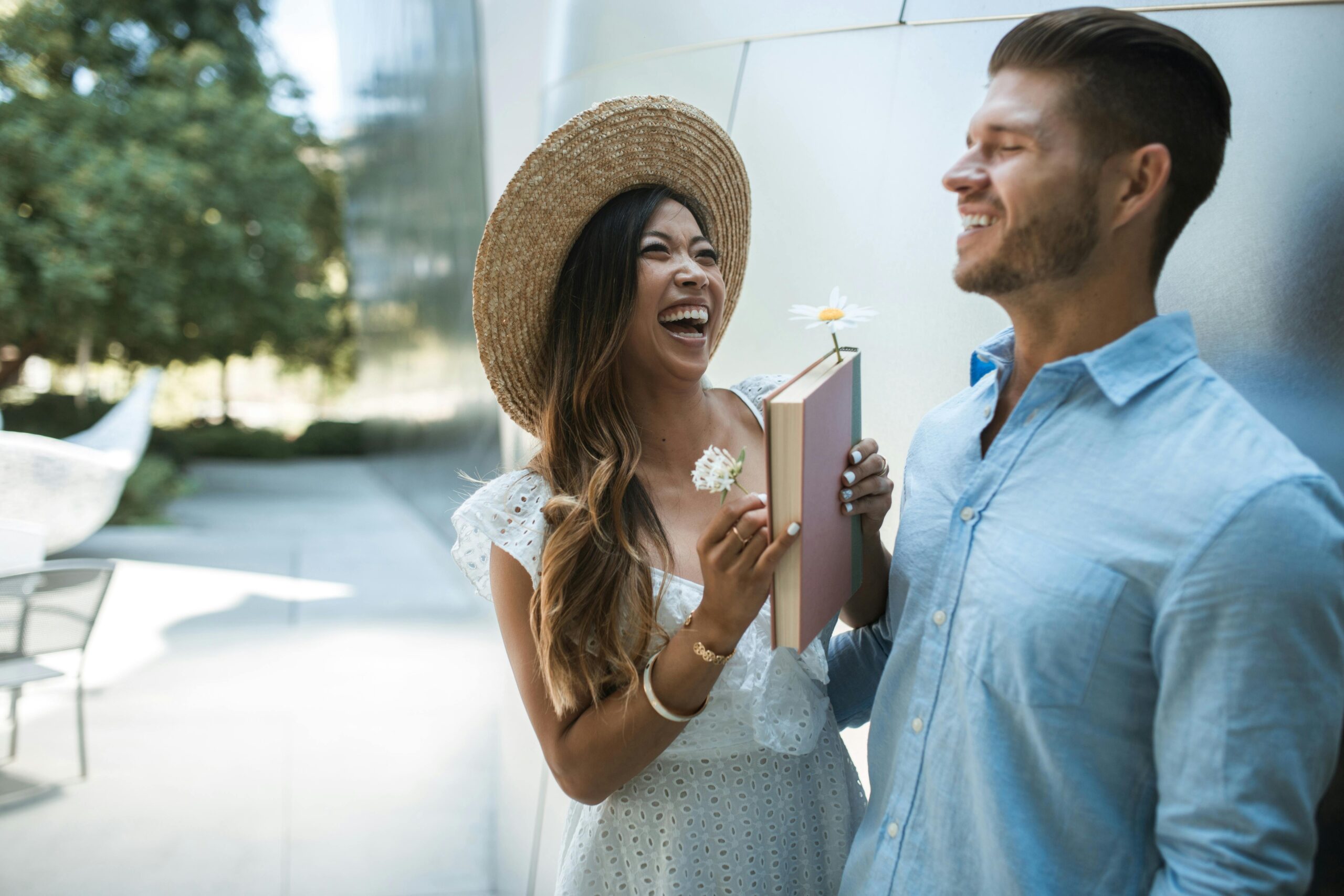 Image of couple laughing with each other.